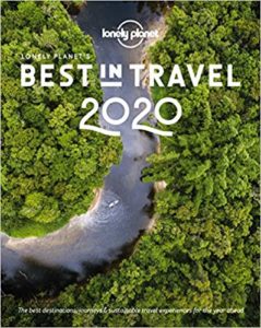 Front cover image of Lonely Planet's best places to travel in 2020 with a kayak sailing down a river